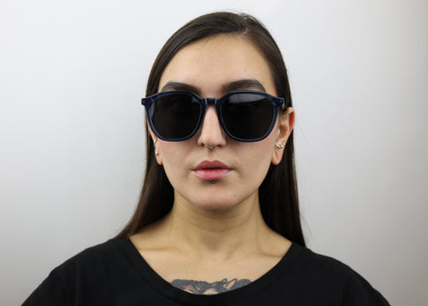 Woman wearing these luxury designer SEE sunglasses