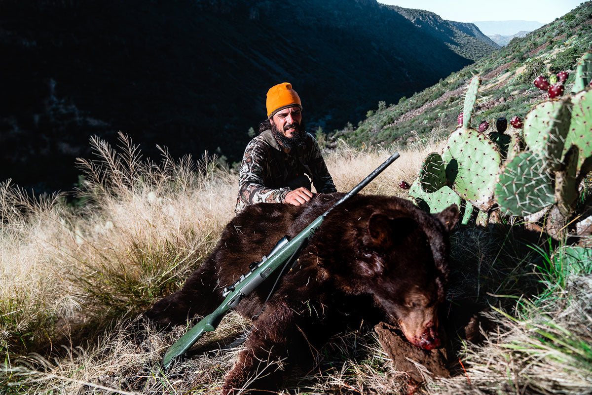 The author, Josh Kirchner, with his black bear.