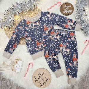 Christmas day outfit for children. Nutcracker and rocking horse printed top and leggings set