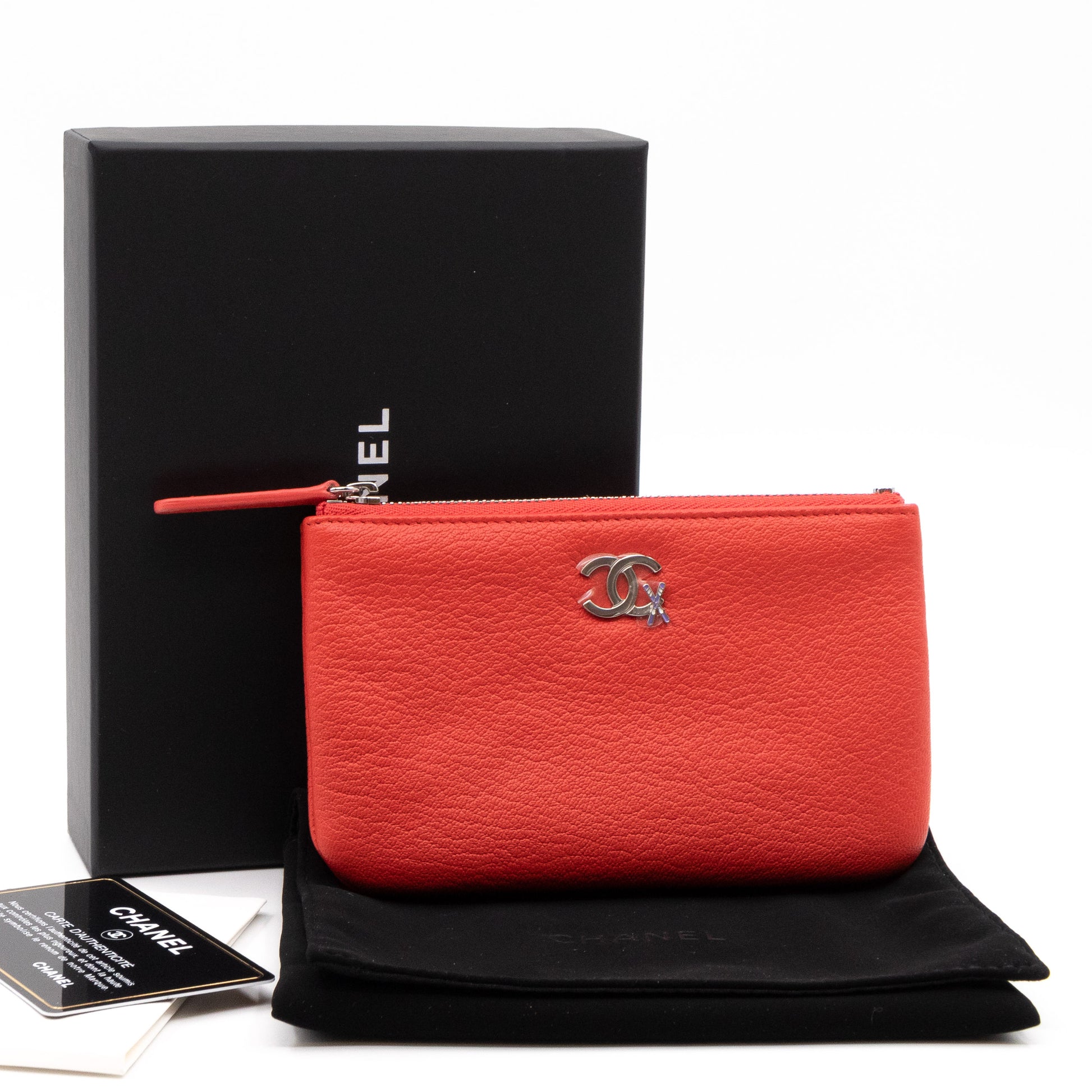 Chanel – Chanel Classic Mini Pouch Lucky Ski Edition Coral Leather – Queen  Station