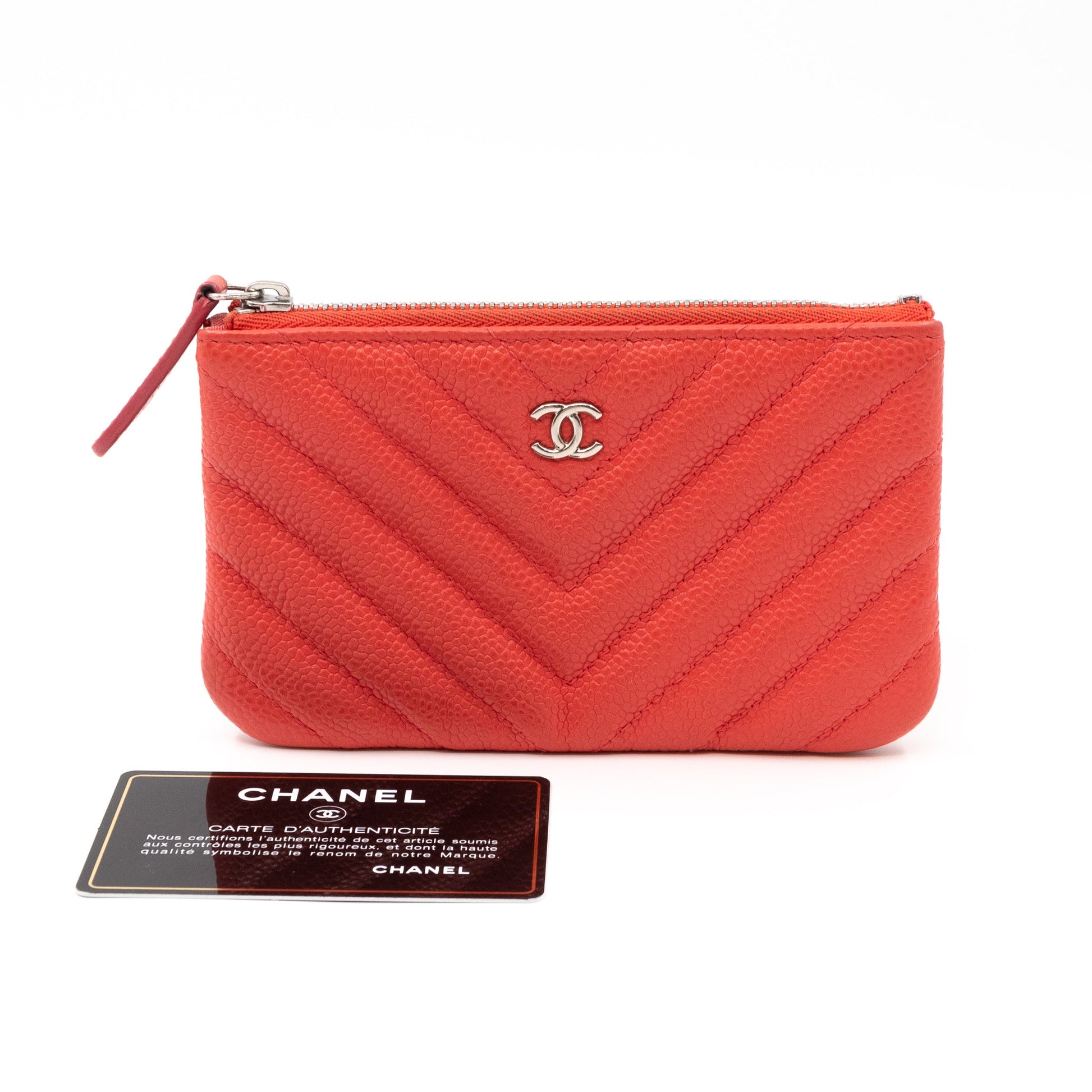 Chanel – Chanel Classic Mini O Case Coral Caviar Leather Chevron Quilted –  Queen Station