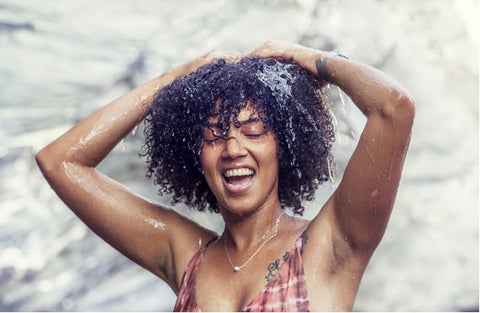 woman girl massaging hair scalp joy 