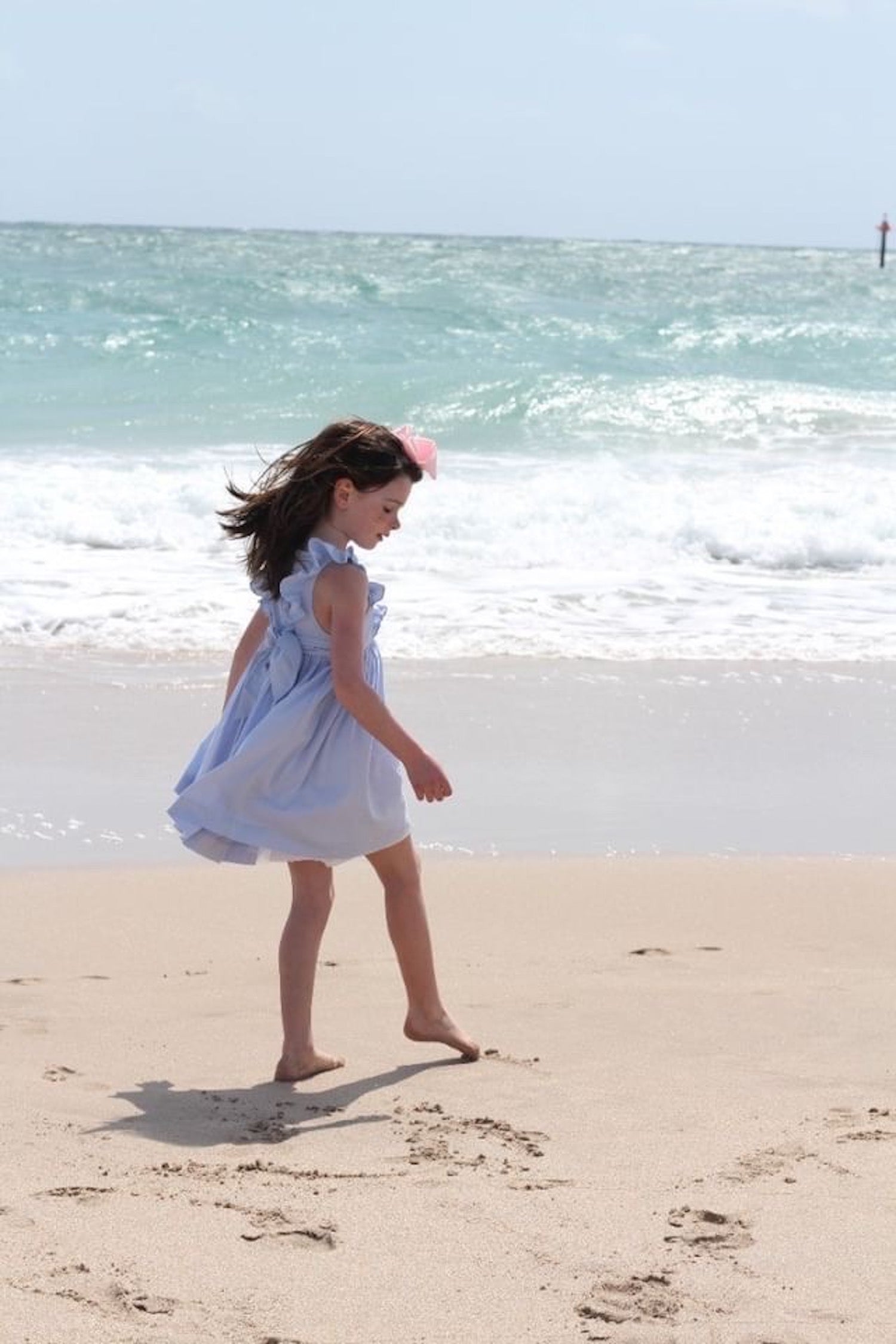 Charlotte sy Dimby classic chic little princess twirling handmade smocked dresses for babies and girls - precious elegant French style heirlooms dance on the beach florida