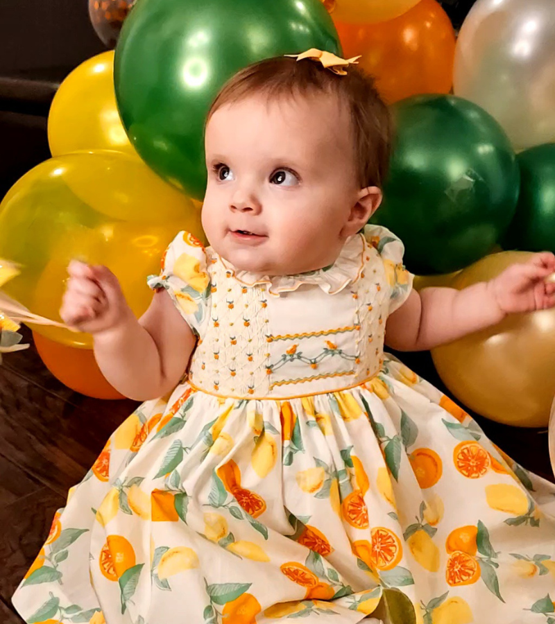 Orange and lemon citrus theme birthday party children inspiration dress and decor Charlotte sy Dimby