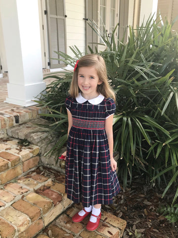 Frazier in her Tartan smocked Cerise dress looking ever so sweet!