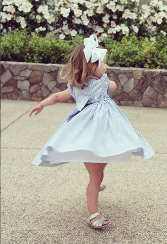 handmade smocked dress twirling happy client charlotte sy dimby