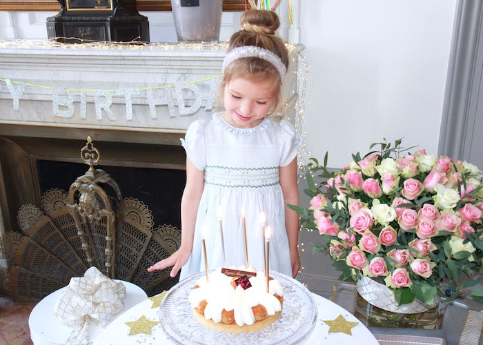 Celebrating the magic of childhood - Classic chic handmade traditional smocked dresses for babies and girls by Charlotte sy Dimby