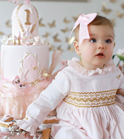 Pink velvet handmade smocked dress with golden details