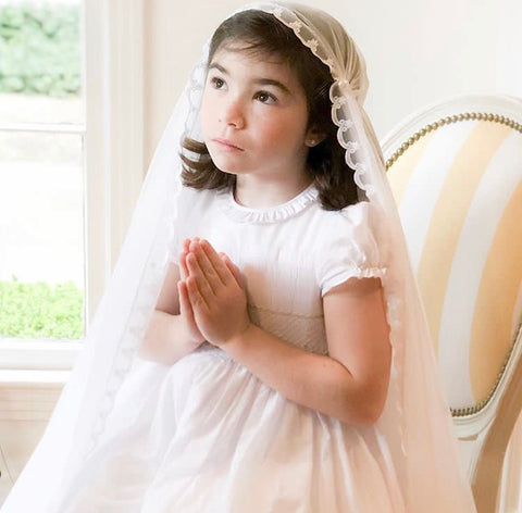 Thank you to Marie Thérèse for chosing our white Amandine smocked dress for her Holy Communion