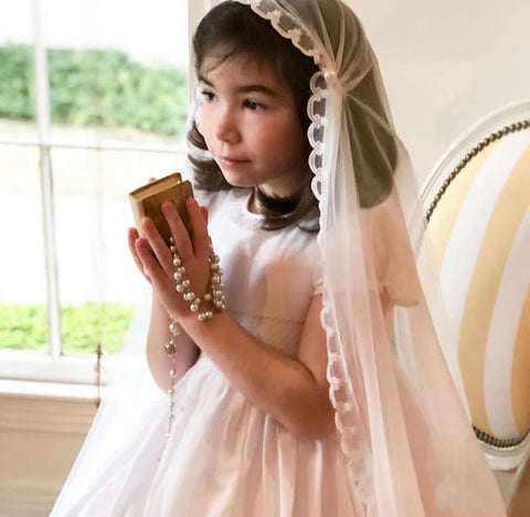 Thank you to Marie Thérèse for chosing our white Amandine smocked dress for her Holy Communion