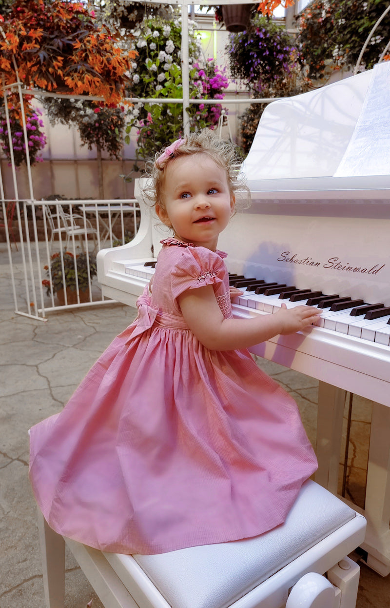 Charlotte sy Dimby and Shari traditional child portrait in smocked dress