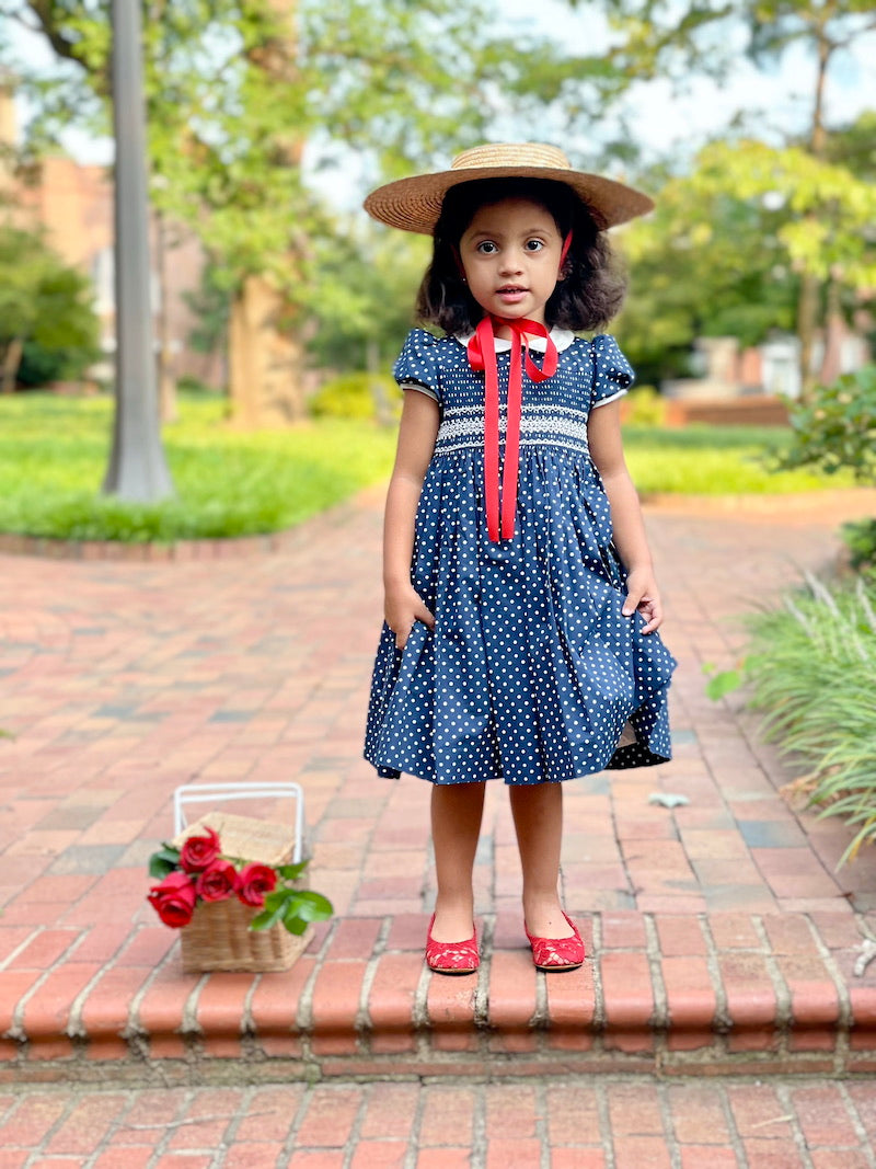 Charlotte sy Dimby and Shari traditional child portrait in smocked dress