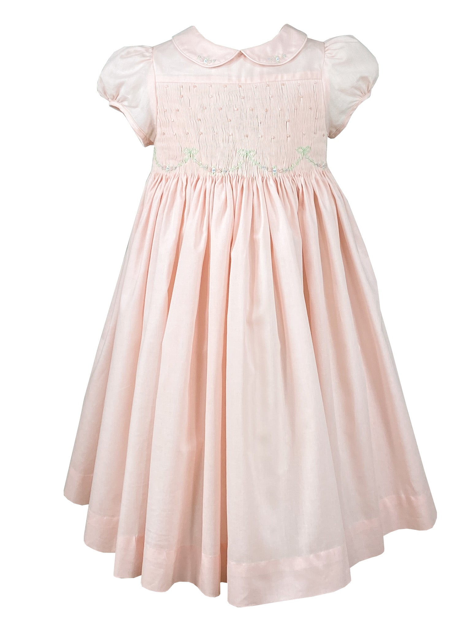 Charlotte sy Dimby French theme birthday party Ladurée pink smocked dress
