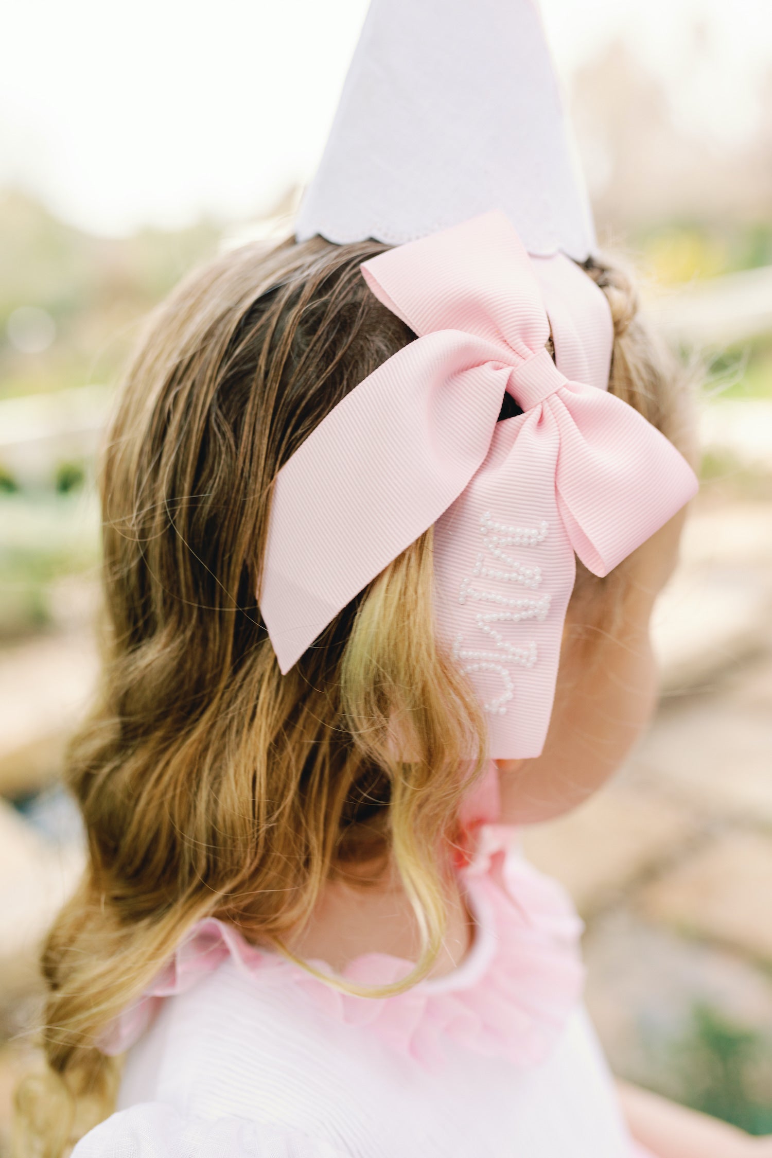 Pink monogrammed bow with pearls Charlotte sy Dimby pink bow pearl party dress and inspiration for children little princess