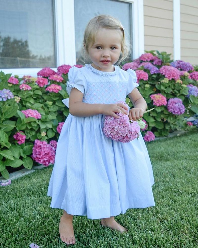 Charlotte sy Dimby and Shari traditional child portrait in smocked dress