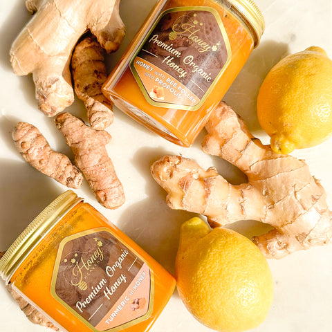 ginger, turmeric and honey on a white background