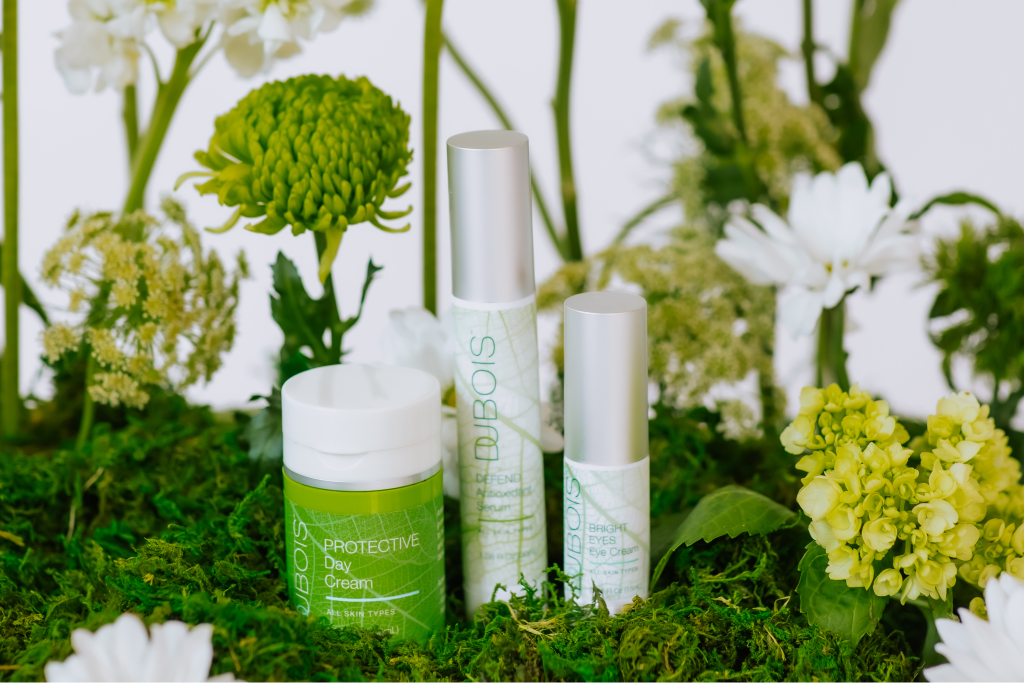 skincare products with flowers in the background