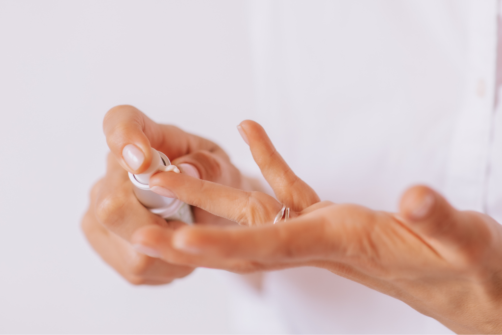 woman pumping serum on fingers