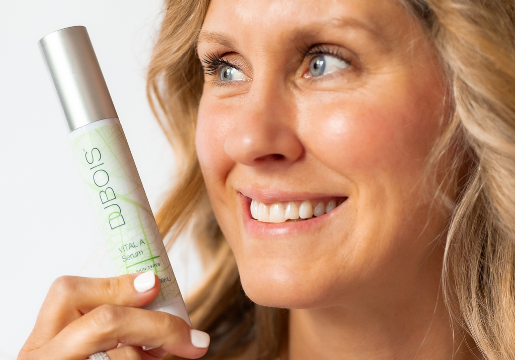 woman holding serum