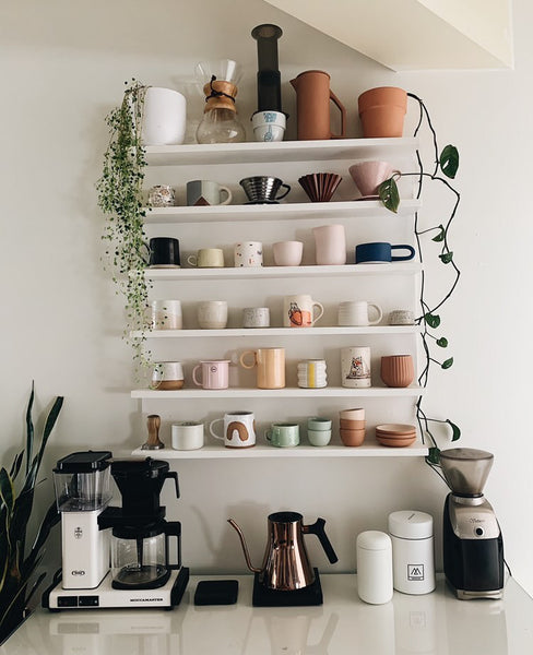 Home coffee bar with shelving for mugs