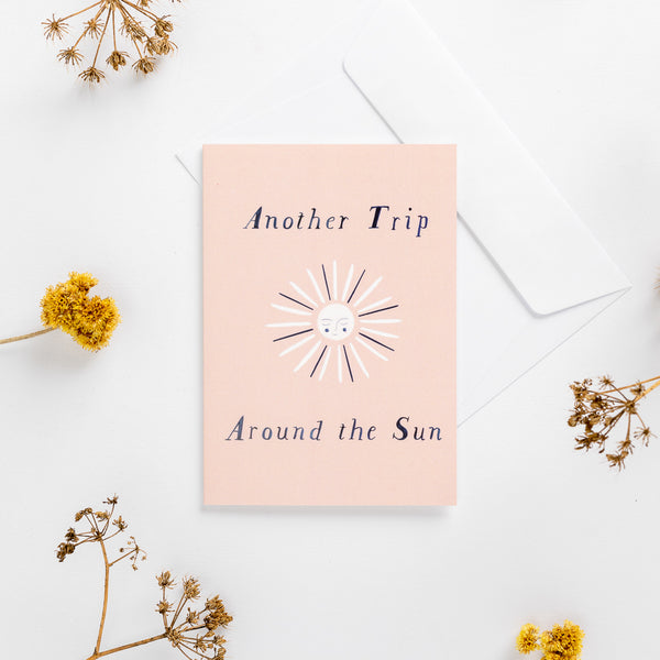 'Another Trip Around the Sun' pink Greeting Card