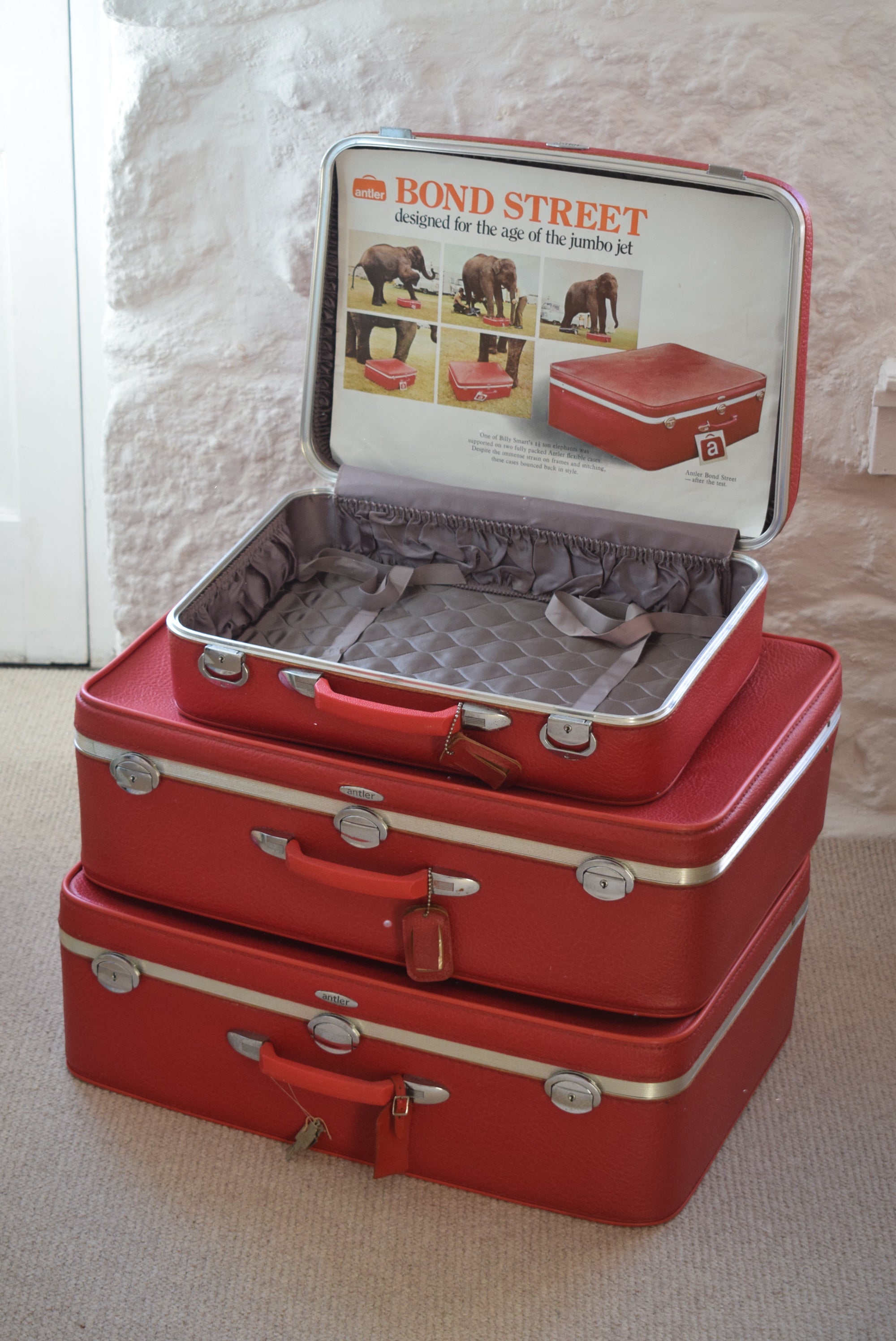 antler red suitcase