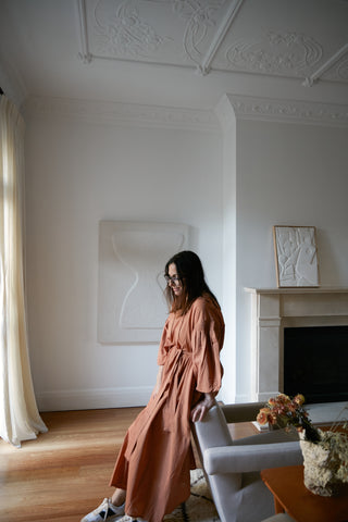 Jacqui Turk at home wearing the Little Tienda Dunes Martha dress