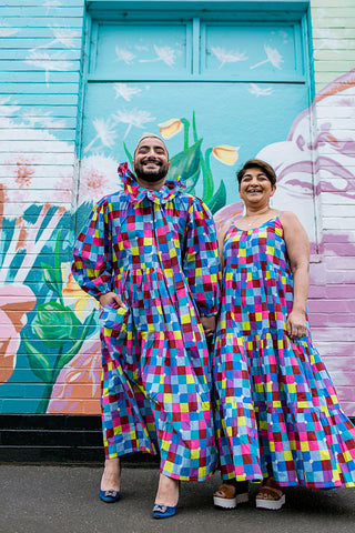 Deni Todorovic and their mum wearing Little Tienda Rainbow Disco pieces. 