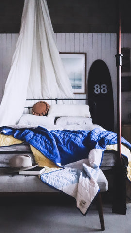 Jason Grant styles his bed with the Little Tienda Playa Quilt