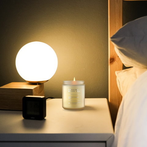 a candle with the scent mixed with bergamot and white tea 