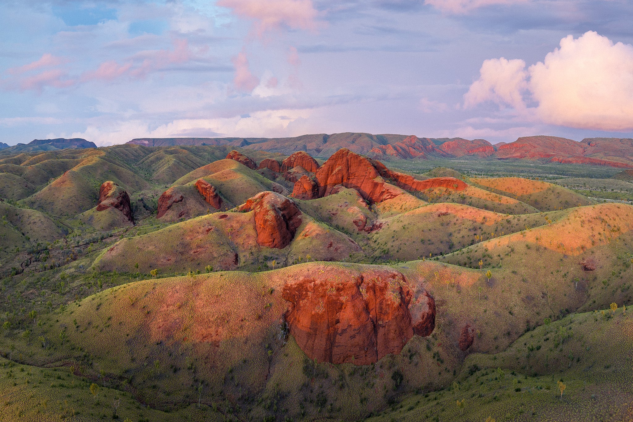 sunrise over a mountain range in the kimberley region of western australia