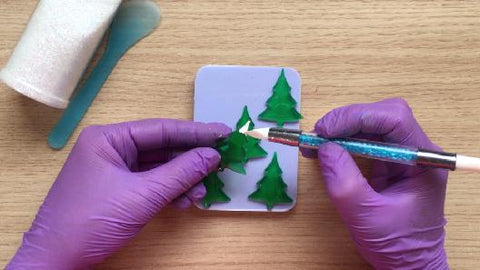 painting tree tops with white acrylic paint