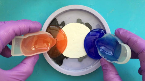 pour colored resin into mold