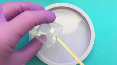 Pour a second layer of clear epoxy resin into your mold