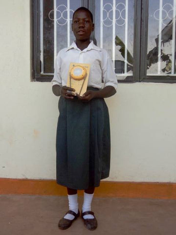 Jordbarn solar lamp donation to schoolgirl