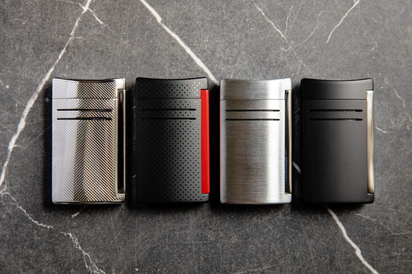 s.t. dupont maxijet torch lighters in chrome, black & red, chrome grid and matte black