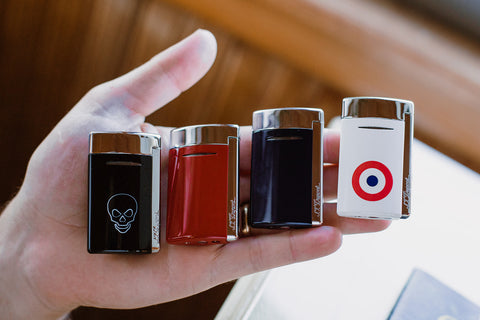 s.t. dupont minijet lighters in hand