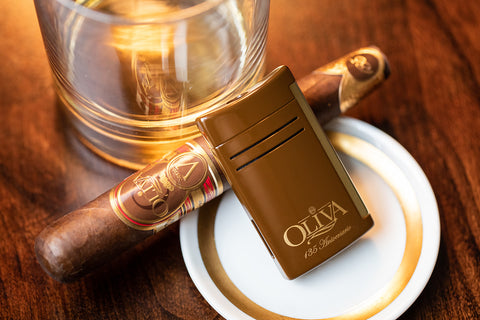 Maxijet oliva lighter with brown and gold finish.