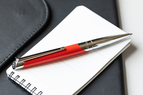 S.t. dupont defi millennium ballpoint pen in orange and chrome