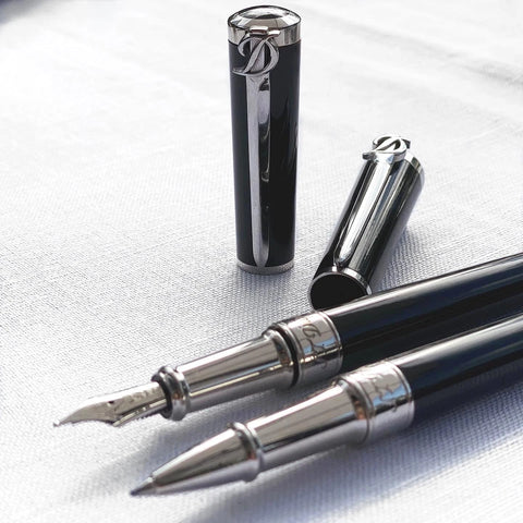 S.T. Dupont Sword Collection fountain pen and rollerball pen in black lacquer with palladium accents