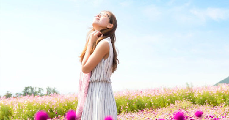 Women outside in nature dealing with her emotional health