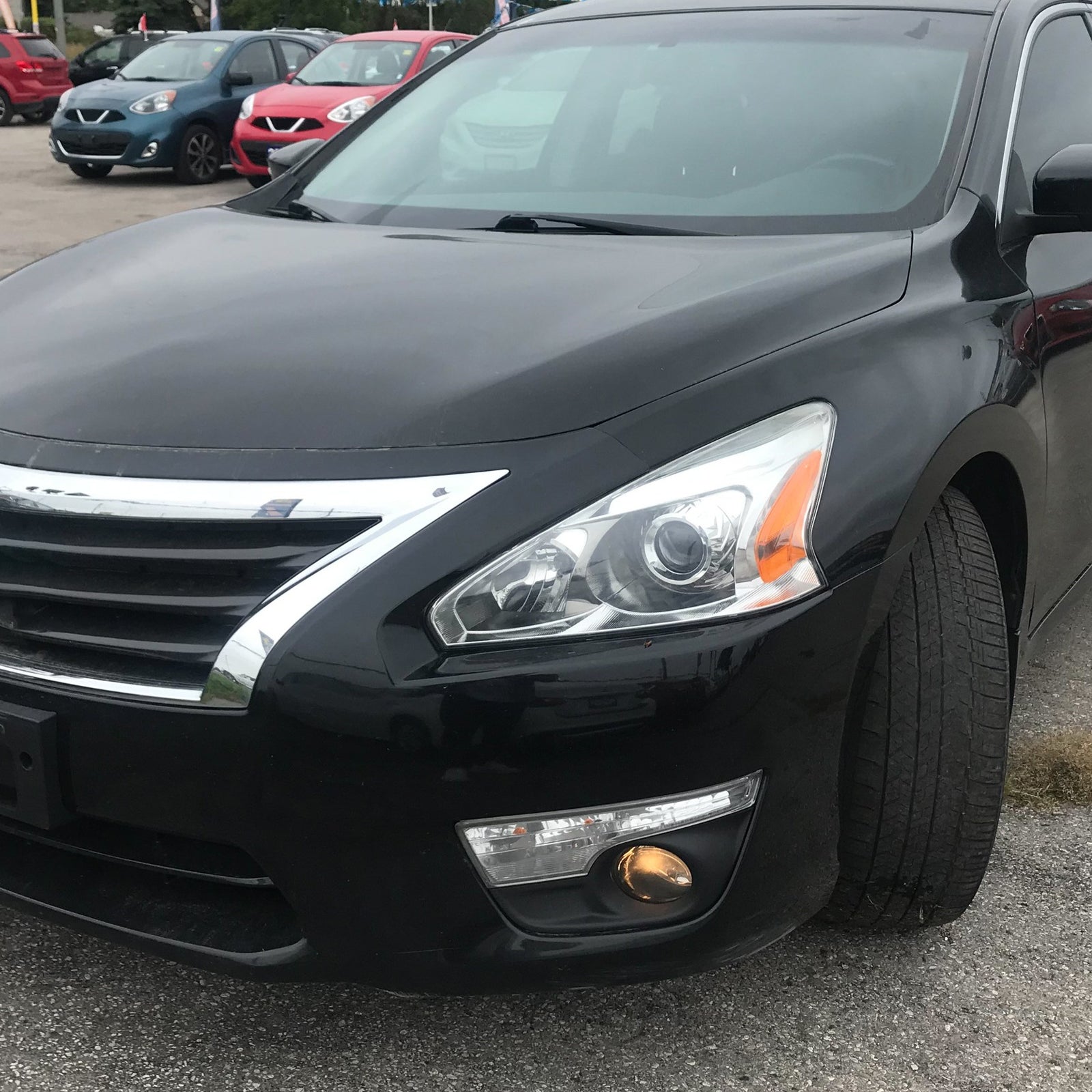 2014 altima headlight replacement