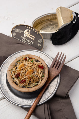 Baby Eels in Stoneware Dish