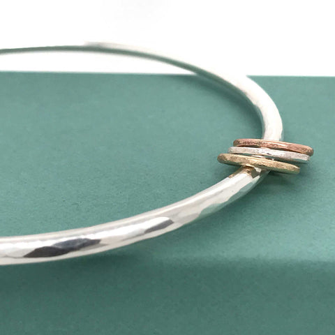 sterling silver chunky bangle with multi-coloured metal rings rose gold yellow gold kriket broadhurst jewellery Sydney