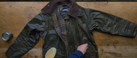 A Barbour Waxed Canvas Jacket being Treated for Durability