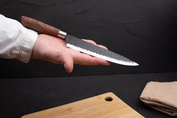 present a knife as a ceremonial display