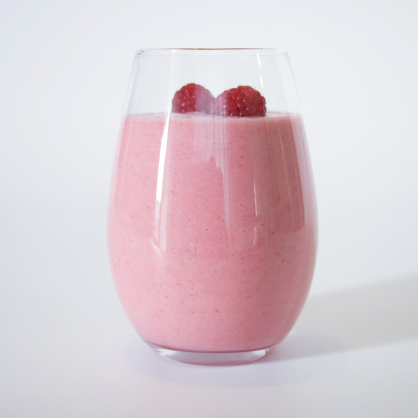 Antioxidant Blast Berry Banana Smoothie in a clear glass | Adashiko Collagen | 100% Natural Skincare