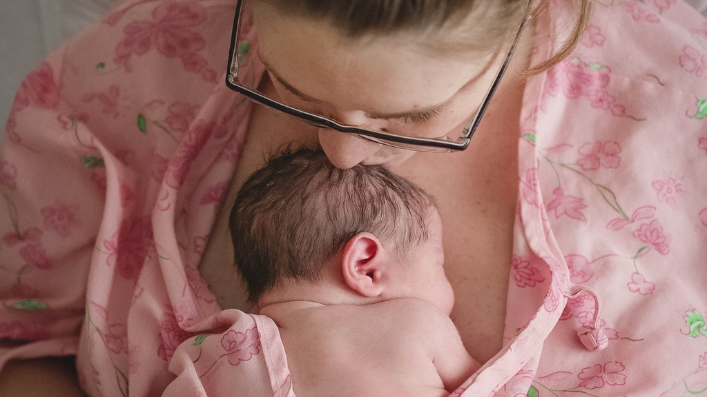 mother holding her baby