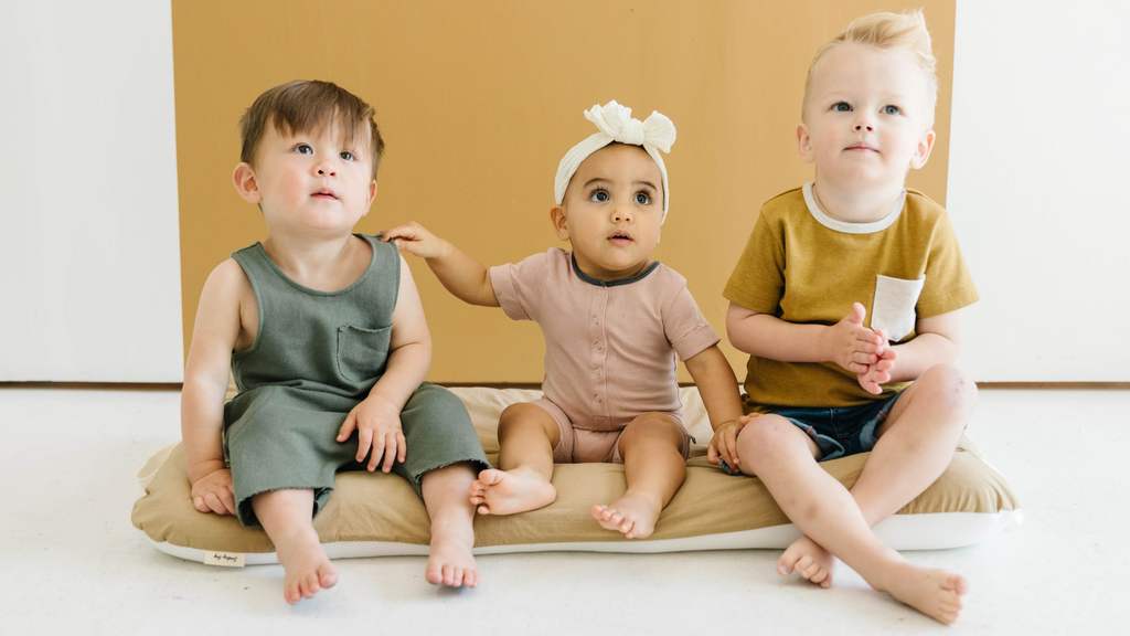 children sitting on the floor