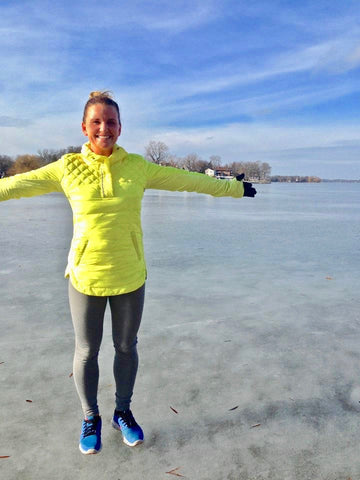 standing on frozen lake in wisconsin